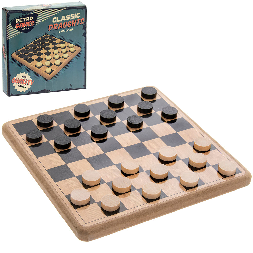 Wooden draughts board game with checkers set up on square board