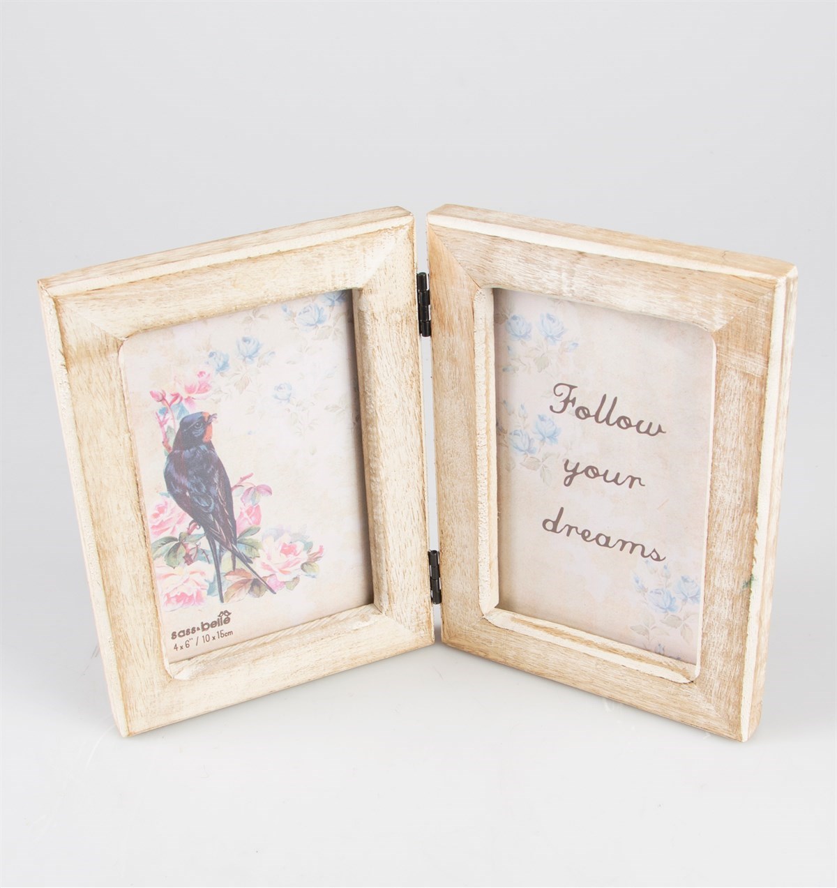 Hinged white wooden photo frame with "Follow your dreams" message
