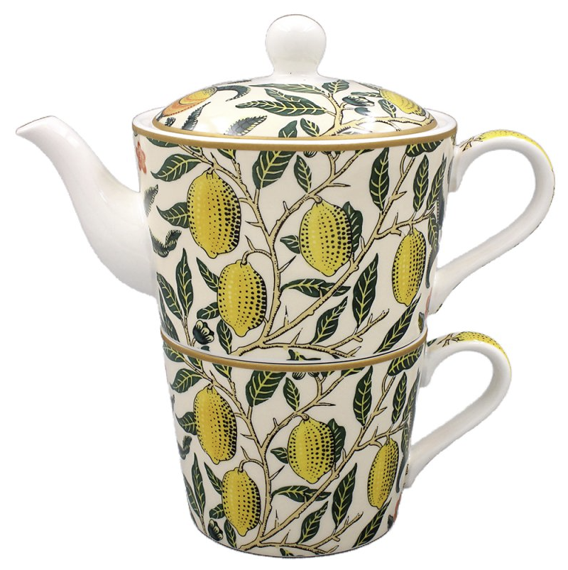 Close-up of ceramic tea set – teapot stacked over cup with handle view