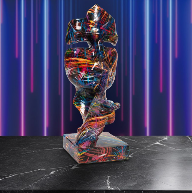 Leonardo Collection Silence Supernova Sculpture displayed on a black marble surface with a vivid neon-lit background, showcasing its multicolour abstract finish and expressive modern design.