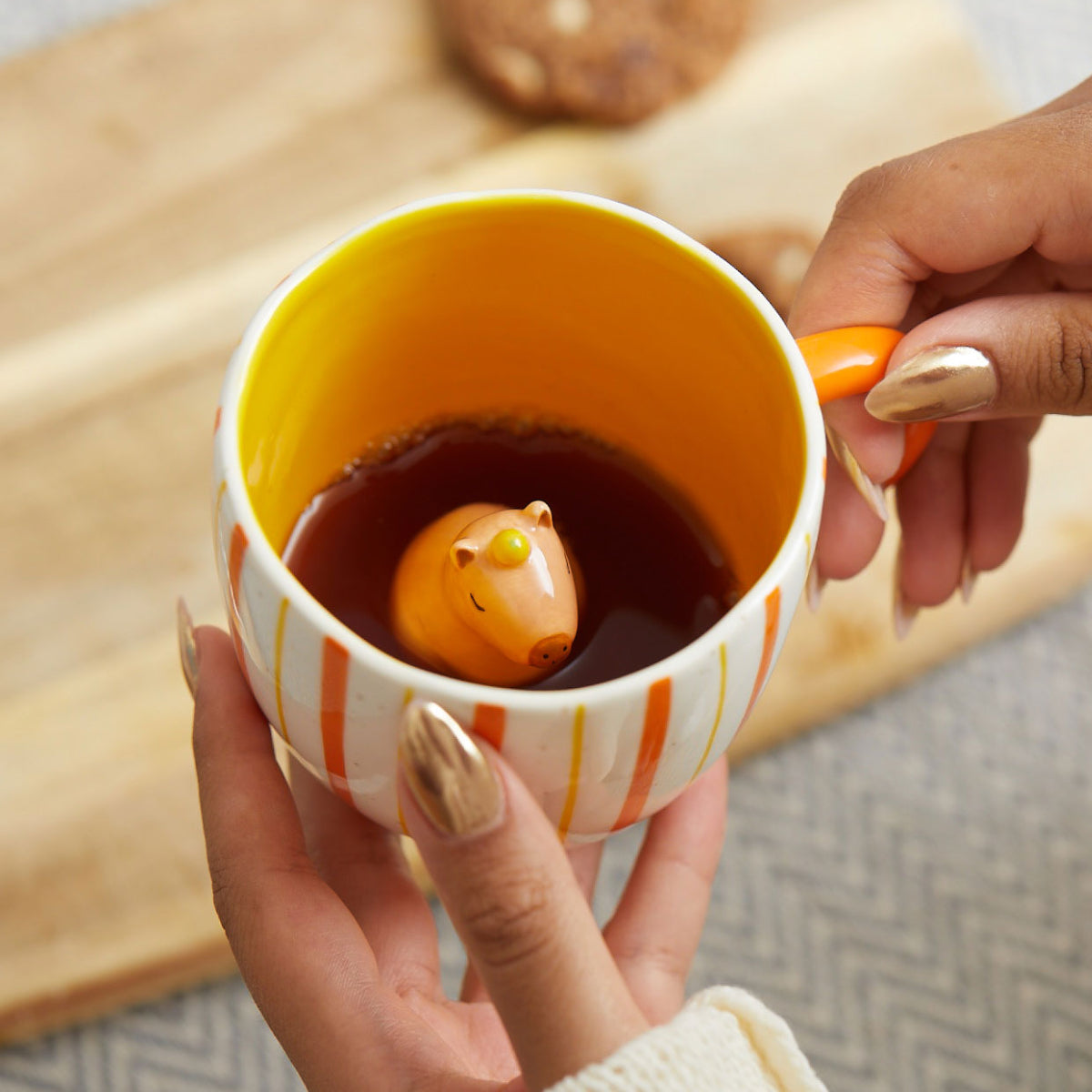 Close-up of hidden capybara detail inside mug