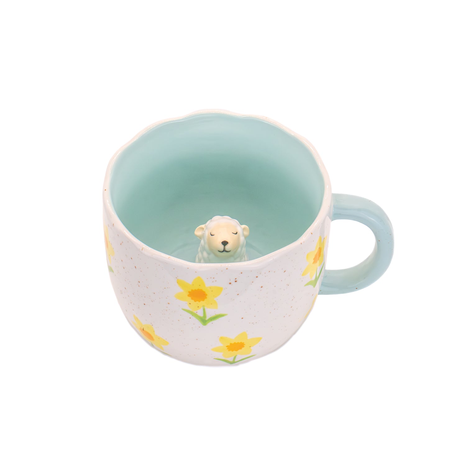 Hidden sheep inside ceramic mug – overhead view