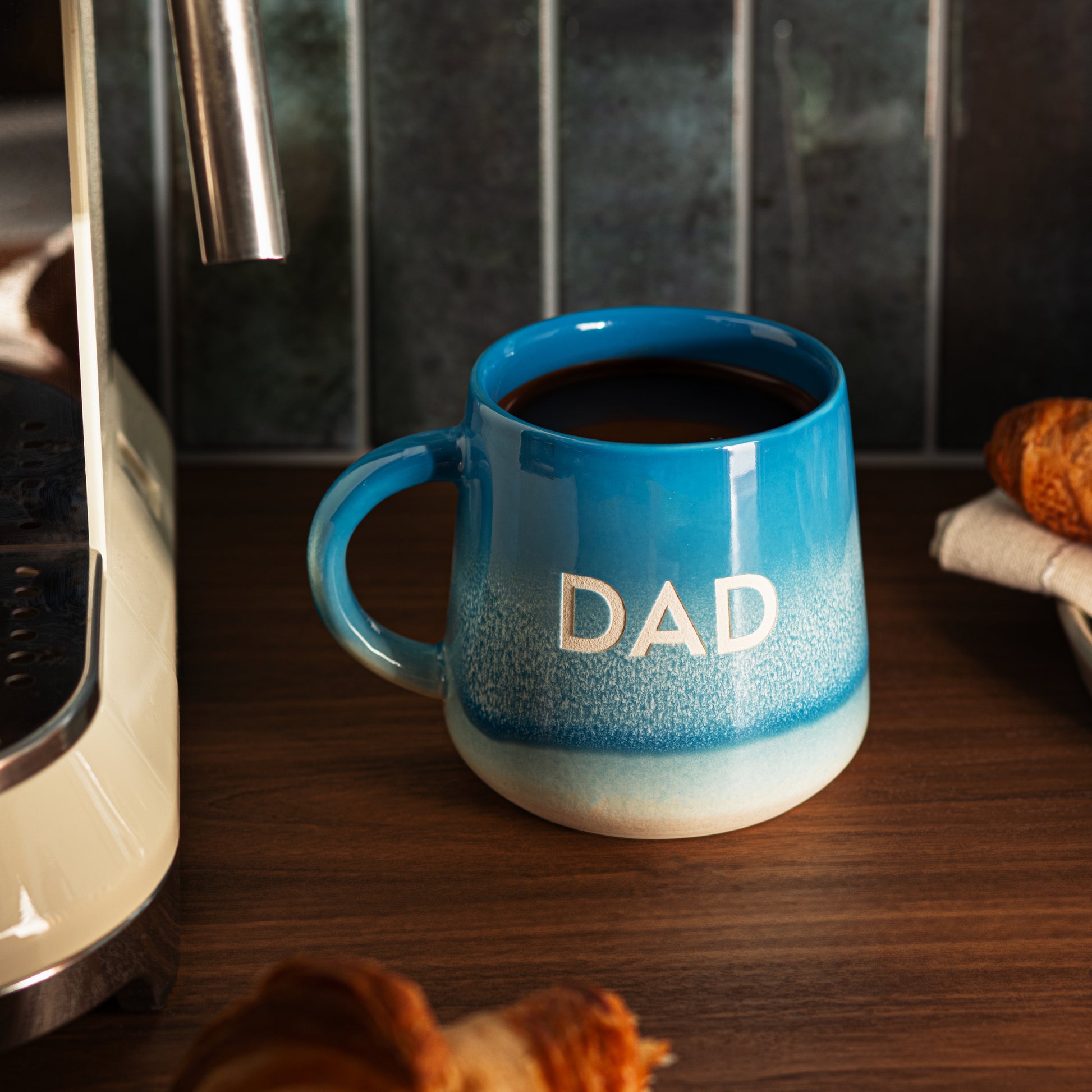 Blue Mojave Dad Mug filled with coffee on breakfast table