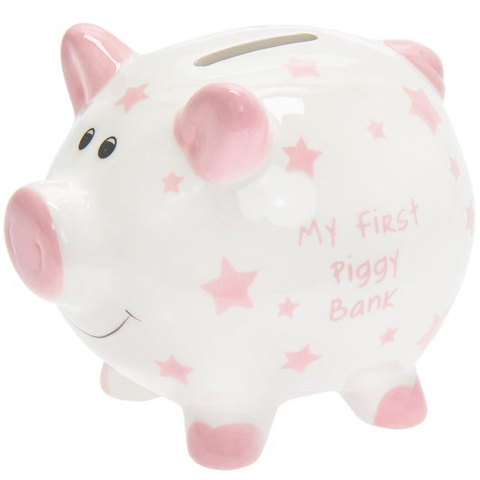 Pink piggy bank with star patterns and 'My first piggy bank' text on a white background