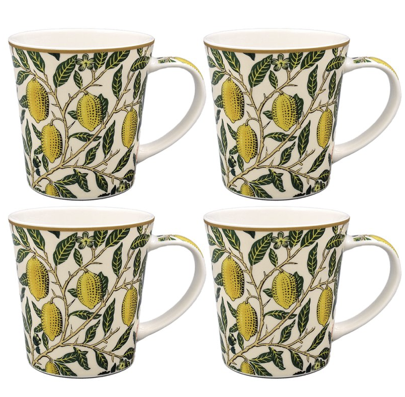 Close-up of four fine china mugs with yellow fruit and leaf motifs