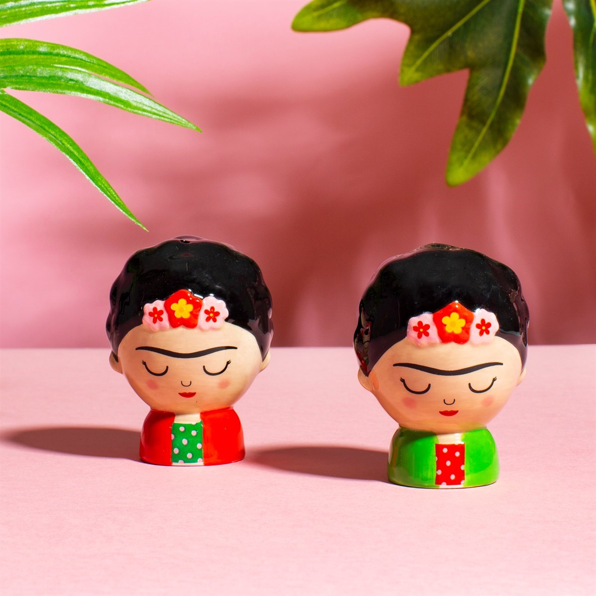 Frida Kahlo-inspired Salt & Pepper Shakers on pink background
