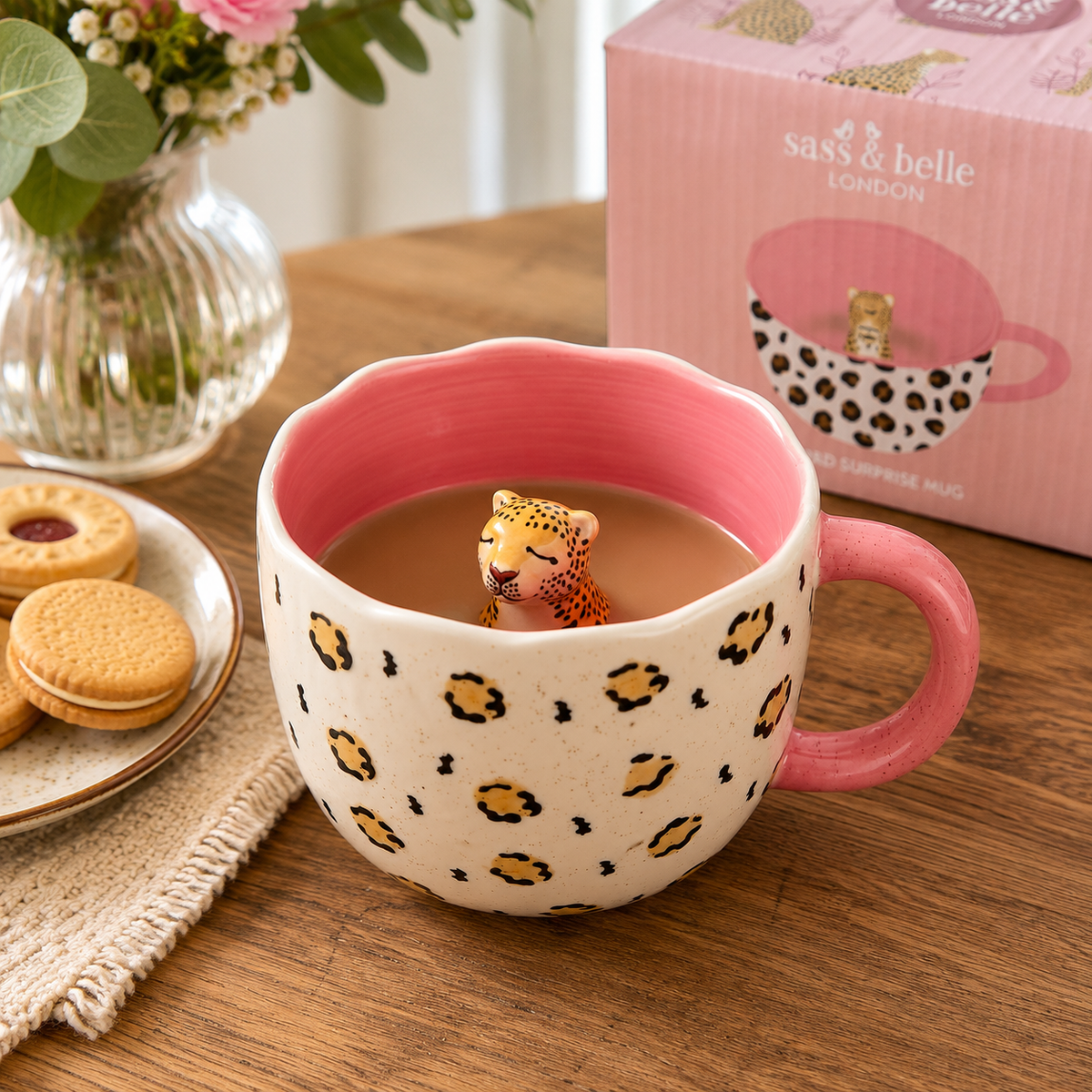 Sass & Belle Surprise Leopard Mug lifestyle image with biscuits