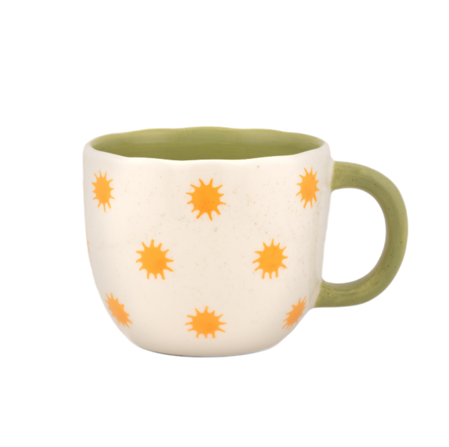 Sass & Belle Surprise Giraffe Mug with yellow sun pattern and green handle