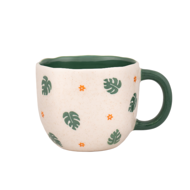 Sass & Belle Surprise Tiger Mug with tropical leaf pattern and green handle