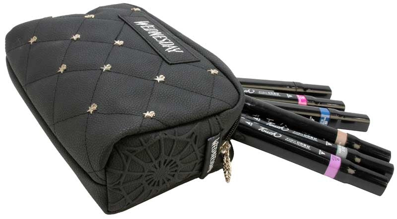 Official Wednesday TV show cosmetic bag open with makeup brushes inside